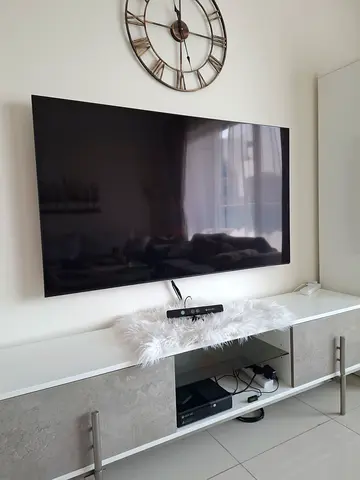 65-inch Sony LED TV - Wall Mounted, Good Condition