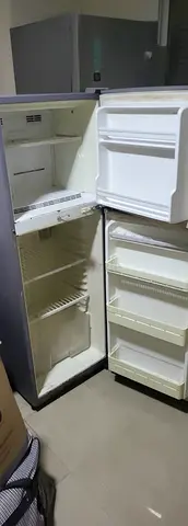 Used top-freezer refrigerator - working,