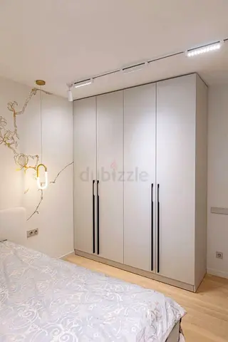 Modern 4-Door White Wardrobe with Long Black Handles