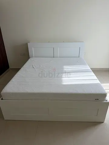 White wooden double bed frame with mattress - good condition