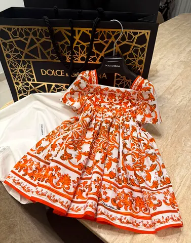 Dolce & Gabbana girl's orange baroque print dress - like new