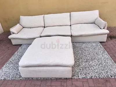 4 piece Home centre swin feather filled sofa with footstool