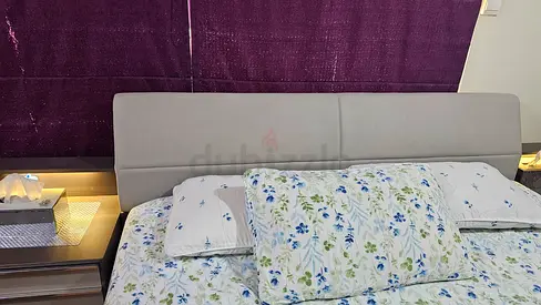 King size bed with dresser and mirror