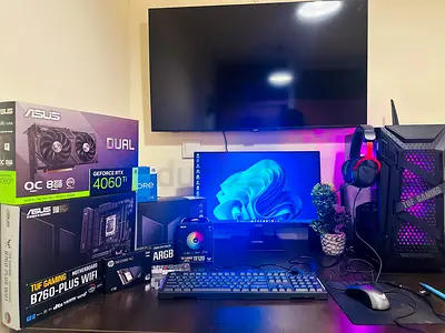 Gaming desktop setup with RGB PC, monitor, keyboard - ready to use