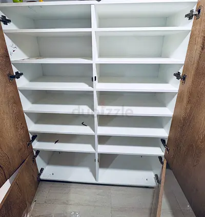 White wooden storage cabinet with multiple shelves (used)