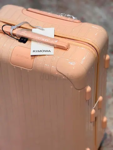 Stylish Rimowa carry on suitcase