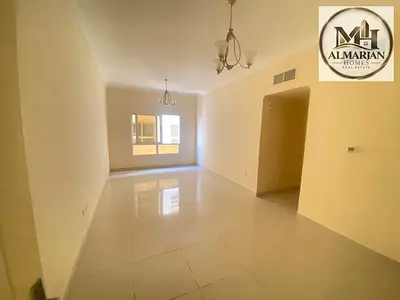 Annual 2-bedroom apartment for rent in Al Nuaimiya 1, Ajman, near Al Hikmah School, in a prime residential tower with a vibrant location.