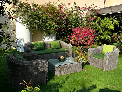 Outdoor wicker 3-seater sofa plus table