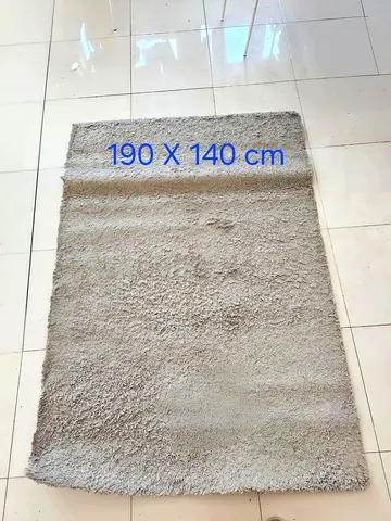 URGENT....Light Beige $%&! Rug 190 x 140 cm - Good Condition