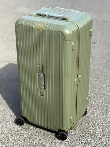 Rimowa green travel luggage