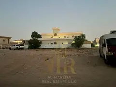 For sale: Two residential/investment land plots in Al Muwaihat 2, Ajman. Prime location. Total area
