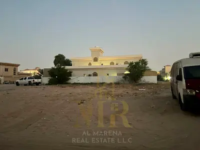 For sale: Two residential/investment land plots in Al Muwaihat 2, Ajman. Prime location. Total area for both plots: 10,000 square feet. Price per plot