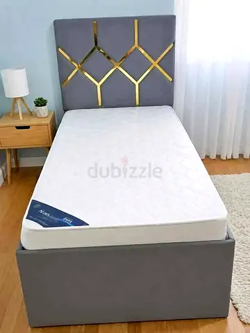 New Single upholstered bed frame with storage base and decorative headboard - grey
