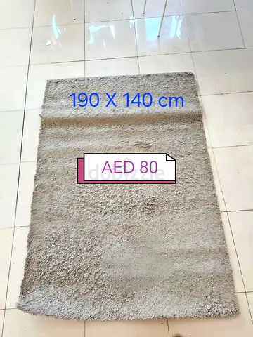 Light grey shaggy rug