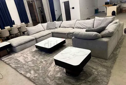 Modular pan Emirates Pianca corner feather filled sofa with footstool