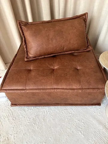 Brown leather-look armless accent chair / single seat MOVING SALE