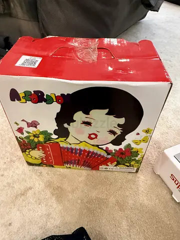 Vintage-style boxed doll set in original box