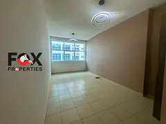 Beautiful 2-bedroom apartment with a living room in Ajman, 3 bathrooms, gym, pool, garden, built-in 
