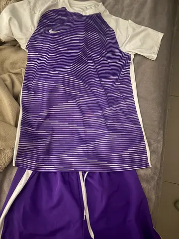 Purple and white sports jersey and shorts set (Nike) - size unclear