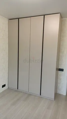 Built-in 4-door modern wardrobe - neutral matte finish