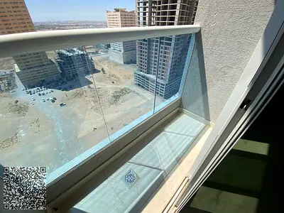 An opportunity to own a two-bedroom apartment with a living room in the Gulf Tower project, located in the Al Amerah area of ​​Ajman. The unit spans 1