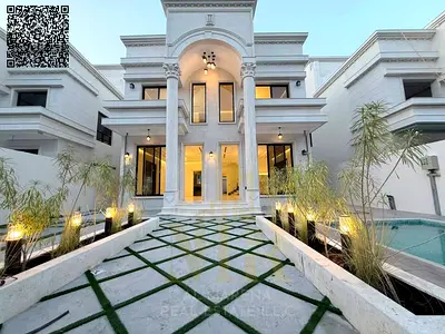 In Al Helio 2: An elegant, classic-style mansion featuring two floors and a roof terrace, complete with a swimming pool and a large courtyard. Set on