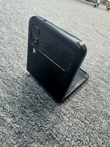 Used Samsung Foldable Phone with Protective Case - Good Working Condition