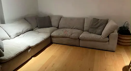 Excellent condition ___pan Emirates Pianca corner feather filled sofa