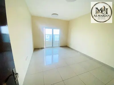 1BR in Al Nuaimiya 1, Ajman, 2 bathrooms, balcony, central AC, tower gym, near Ghalfa Bridge, easy access to Dubai and Sharjah.