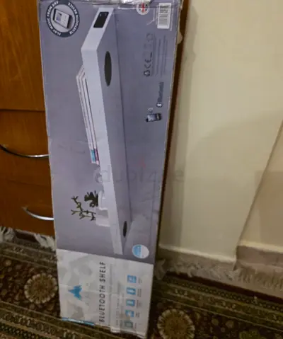 Bluetooth Soundbar Shelf with Built-in Speakers (New in Box). AED 200 Only!