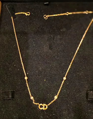 Doir -Delicate gold-tone chain necklace with CD-style centerpiece