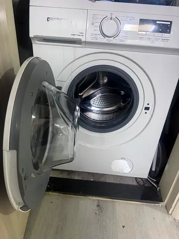 Front-load washing machine with spare door/frame - used
