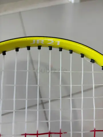 Used yellow racket - good condition