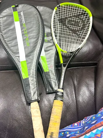 Used Dunlop graphite squash racket with cover x 2 same