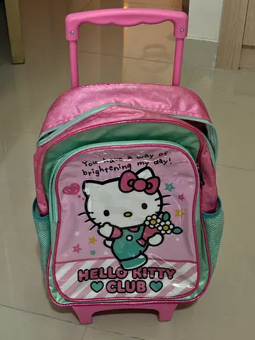 Hello kitty school trolley bag for free