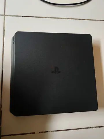 PlayStation 4 Slim console - Black, good working condition With 2 controllers 1 original