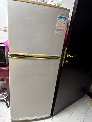 Double-door refrigerator with top freezer - used, working