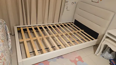 White upholstered queen bed frame with headboard (slatted base) - good condition