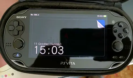 Sony PlayStation Vita PCH-1103 OLED Console + 3 Games & Hard Case Set