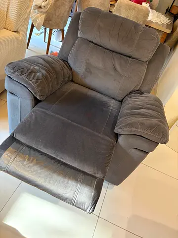 Comfortable single recliner armchair in grey fabric - good condition