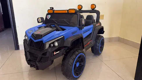 2-Seater Electric Ride-On Jeep for Kids — Blue, Good Condition