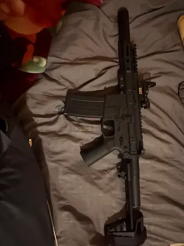 Black toy assault rifle Airsoft - good condition, BB (SLR Brand) with optic and red laser sight