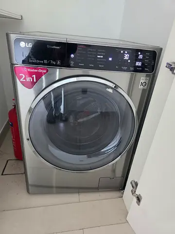 LG 10 kg washer and 7 kg dryer 2 in one new model slightly used