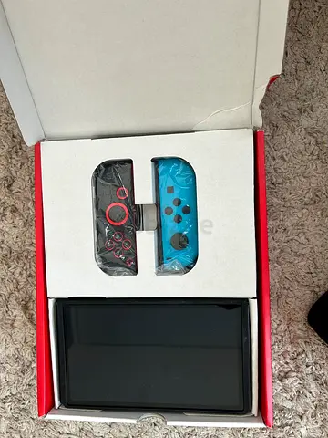 Nintendo Switch console with Joy-Con controllers (like new, boxed)