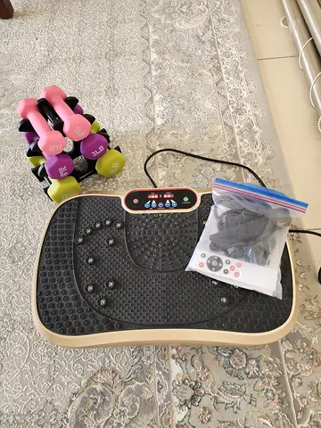 Vibration machine and dumbbells