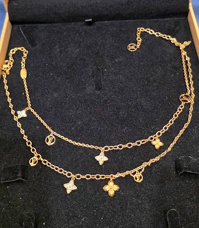 Louis Vuitton-Gold-tone double-layer charm necklace with floral and logo motifs