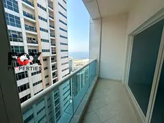 2-bedroom apartment with a living room for annual rent in Ajman One Towers. Features built-in wardro