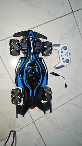 34cm RC Stunt & Drift Car – Rechargeable,  with remote control, Water Smoke Mist, Music & Lights