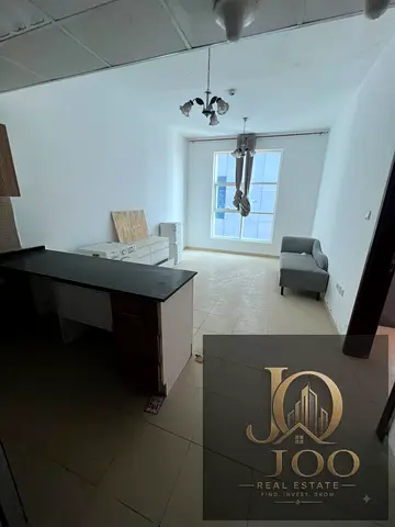 1-bedroom apartment with a living room, 2 bathrooms, balcony, and parking at City Tower, Al Nuaimiy