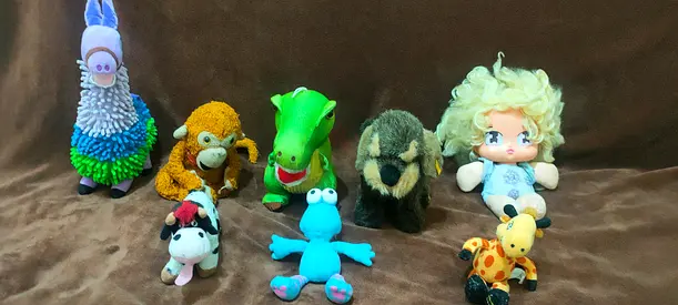 Bundle of 8 assorted plush toys and small dolls - mixed animals & characters